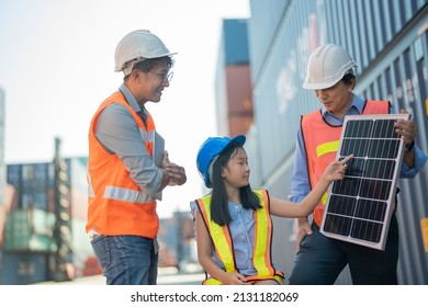 Asian Girl Learning The Technology Engineering Of Renewable Solar Cell . Engineers Meeting Checking And Inspecting. Concept Of Renewable Energy Working. Specialists Testing Photovoltaic Cells Module.