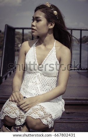 Asian girl on Railway bridge