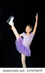 Asian Girl Performing Figure Skate. Figure Skater.