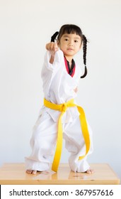 asian girl practice taekwondo