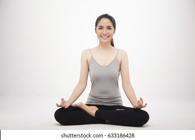 Asian Girl Practice Yoga On White Background