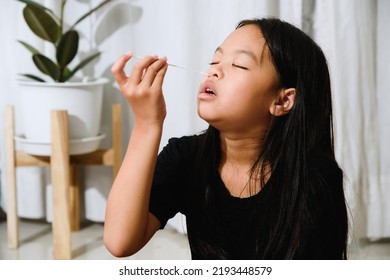 Asian Girl Preteen Girl Getting Swab Test At Home, Covid Quick Rapid Self Test, Kid Antigen Test