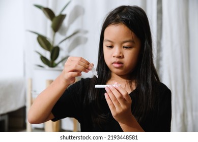 Asian Girl Preteen Girl Getting Swab Test At Home, Covid Quick Rapid Self Test, Kid Antigen Test