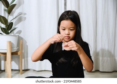 Asian Girl Preteen Girl Getting Swab Test At Home, Covid Quick Rapid Self Test, Kid Antigen Test