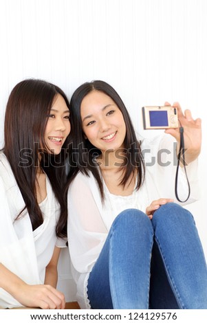 Asian girl self photographing