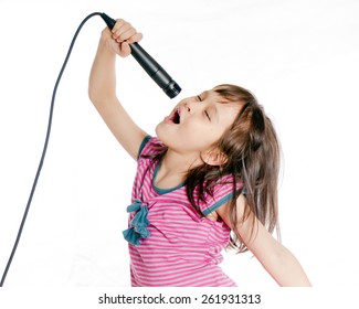 Asian Girl Singing With A Microphone