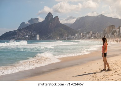 Asian Girl Standing At Ipanema Beach, Rio De Janeiro, Brazil