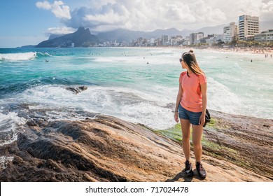 Asian Girl Standing At Ipanema Beach, Rio De Janeiro, Brazil