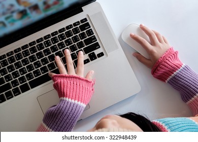 Asian Girl Using A Laptop.