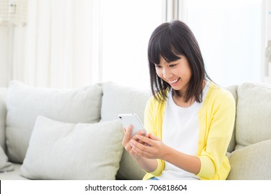  Asian Girl Using Smart Phone