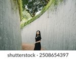 Asian Girl Wearing Black Dress at Fort Canning Area Singapore