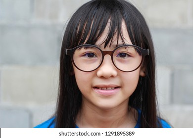 Asian Teen With Glasses