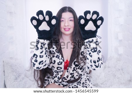 Asian girl wears Cat Paw Gloves for Cosplay on White Background