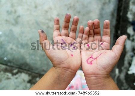 Asian girl's hand with joking and moody face 
