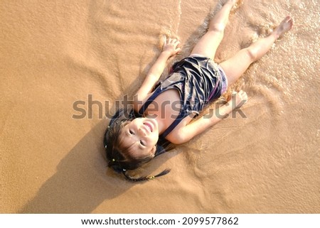 Similar – Image, Stock Photo Tattooed woman in front of a painted wall