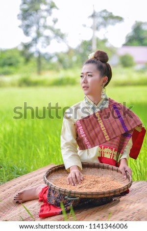 Asian girls of Thai nationality In local costume