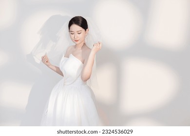Asian girl's white wedding dress