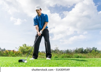 Asian Golfer Preparation To Drive Golf