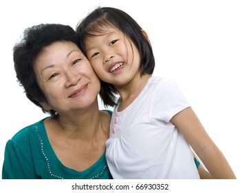 Asian Grandmother And Grandchild On White Background