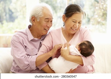 Asian Grandparents With Baby