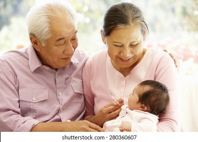 Asian Grandparents With Baby