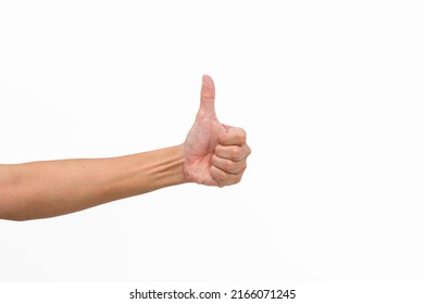 Asian hand of man showing thumb up gesture on white background, Sign Fingers, OK, Good, Like, Great, hitchhiking the car, selective focus, copy space.
