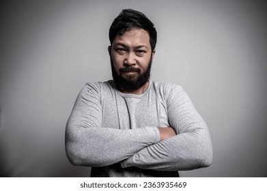 Asian handsome man angry on white background,Portrait of young Stress male concept - Shutterstock ID 2363935469