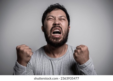 Asian handsome man angry on white background,Portrait of young Stress male concept - Shutterstock ID 2363935477