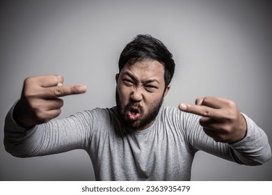 Asian handsome man angry on white background,Portrait of young Stress male concept - Shutterstock ID 2363935479