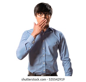 Asian Handsome Man With Glasses Making Surprise Gesture