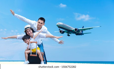 Asian Happy Family Have Fun On The Beach Watching The Landing Planes. Traveling On An Airplane For Leisure And Destination Place Phuket Thailand Asia.  Family Tourism Travel In Summer And Holiday.  