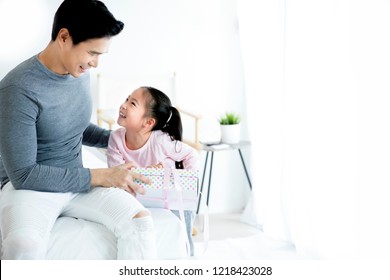 Asian Happy Father's Day Concept, The Daughter Is Giving Gifts To Her Father.