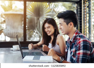 Asian Happy People cheerful studying together in co-working space
