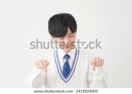 Asian high school boy in white background