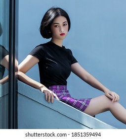 Asian high school girl with short black hair 