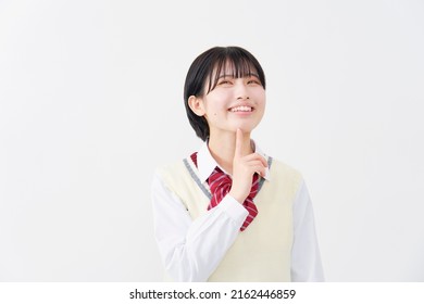 Asian High School Student Thinking In White Background