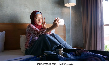 Asian Hijab Girl Selfie In The Bedroom