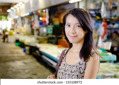 Asian Housewife In The Wet Market