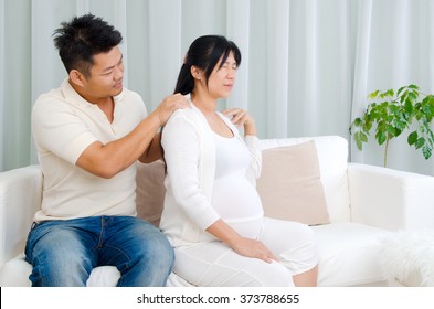 Asian Husband Massage For His Pregnant Wife Who Suffered Shoulder Pain