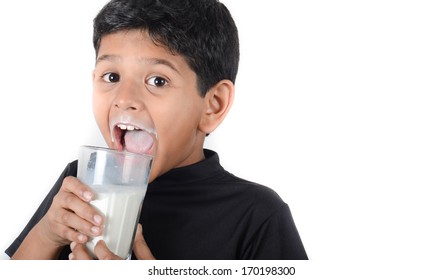 Asian Indian Boy Drinking Milk