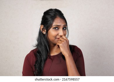 Asian Indian Origin Dark Skin Tone Beautiful Woman Facial Hand Expression Happy Witty Hand On Face