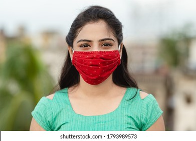 Asian / Indian Woman Wearing Face Mask Against Pollution, Coronavirus Or COVID-19. 