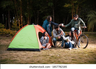 Asian Indian Young Friends Have Good Time On Camping Trip, Relaxing Vacation With Fun Outside Tents