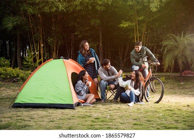 Asian Indian Young Friends Have Good Time On Camping Trip, Relaxing Vacation With Fun Outside Tents