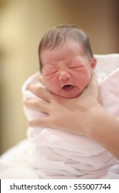 Asian Infant Baby Choking Milks After Breastfeeding.