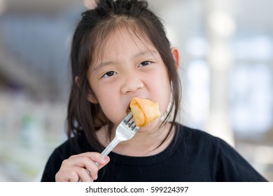 Asian Kid Enjoy Eating Food, Fried Spring Roll