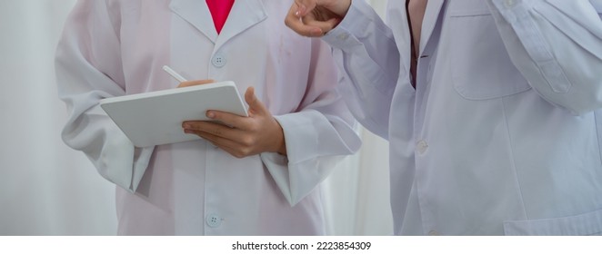 Asian Kid Learning With Scientist In The Laboratory. Physical Examination And Science Education Class.