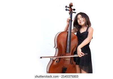 Asian Kid Playing Cello Instrument To Play Classic Music On White Isolated Background (include Path)