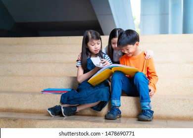 Asian Kid Read Book Together, Education Concept