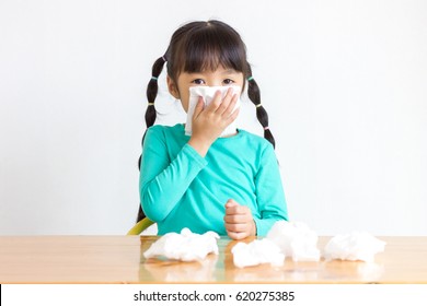 Asian Kid With The Tissue, She Got A Cold.